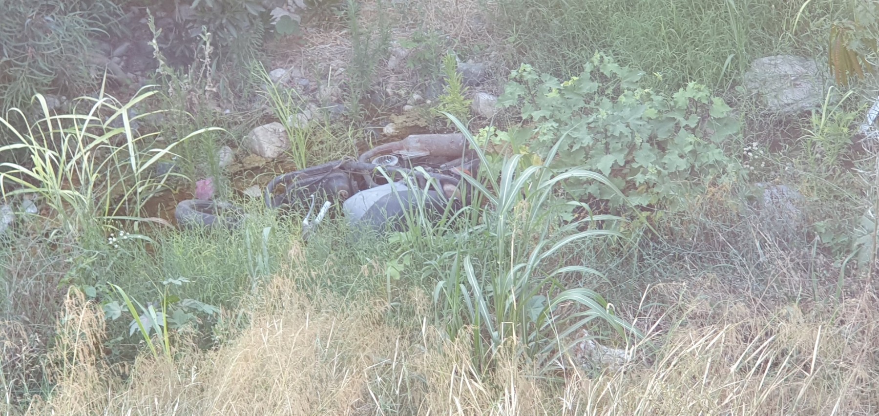 Motorbike dumped in the river --->  *Important Update:* Following the very heavy rainfall on August 29 2026, a significant amount of the garbage previously accumulated here appears to have been swept further downstream. At this stage, it is unclear how far the waste has been carried or to what extent it has been dispersed along the river and surrounding areas. The rainfall may therefore have resulted in the contamination and further spread of waste well beyond the areas where it was originally observed.