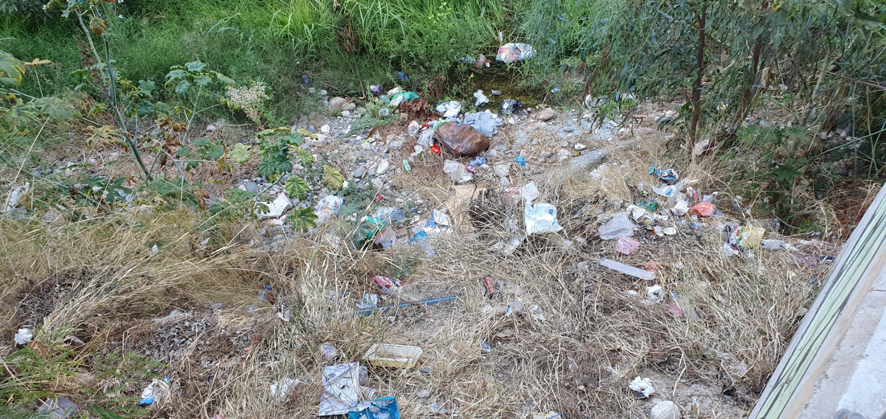 *Important Update:* Following the very heavy rainfall on August 29 2026, a significant amount of the garbage previously accumulated here appears to have been swept further downstream. At this stage, it is unclear how far the waste has been carried or to what extent it has been dispersed along the river and surrounding areas. The rainfall may therefore have resulted in the contamination and further spread of waste well beyond the areas where it was originally observed.